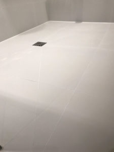 Porcelain tile fully deep cleaned and grout colour sealed